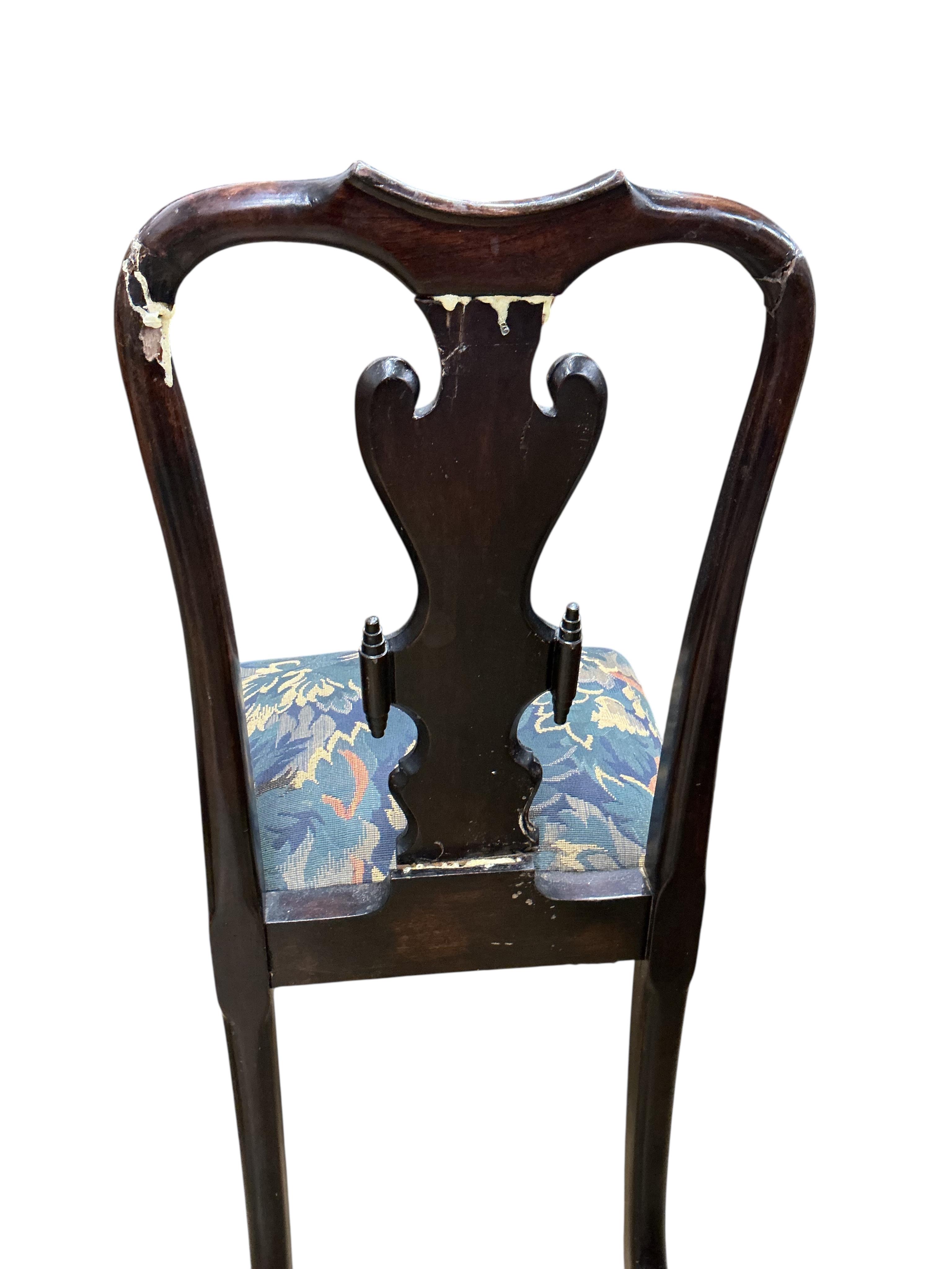 A set of six Queen Anne style mahogany dining chairs